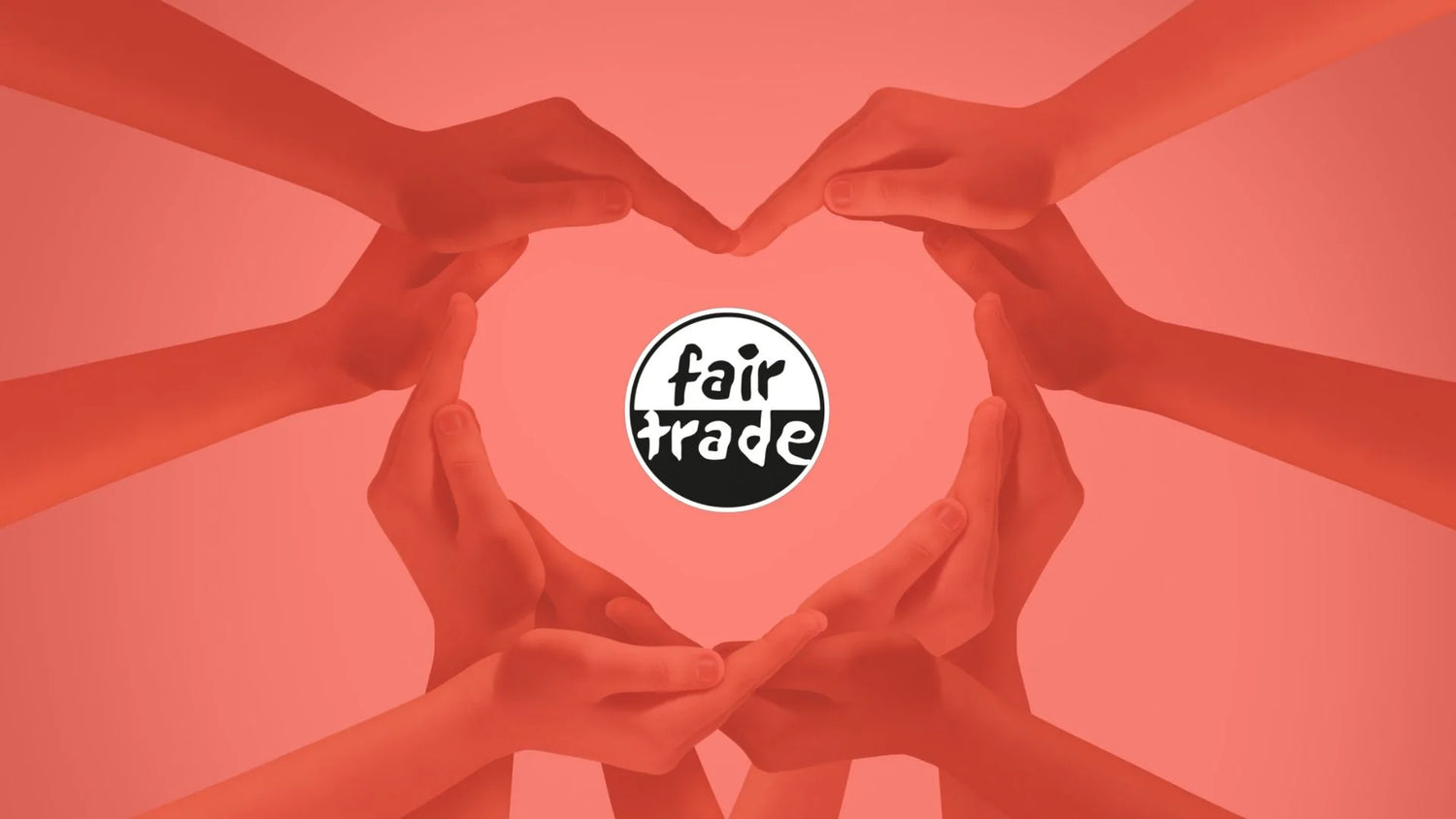 Image Of The Fair Trade Danmark Logo Surrounded By Hands Making The Shape Of A Heart